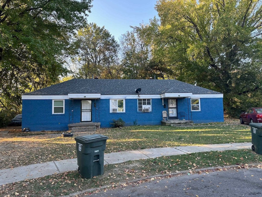 Single story home featuring a front yard
