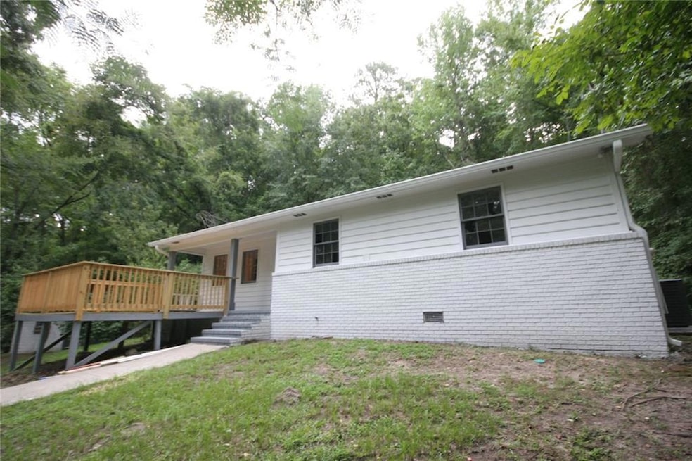 View of front of property with a front lawn and a 