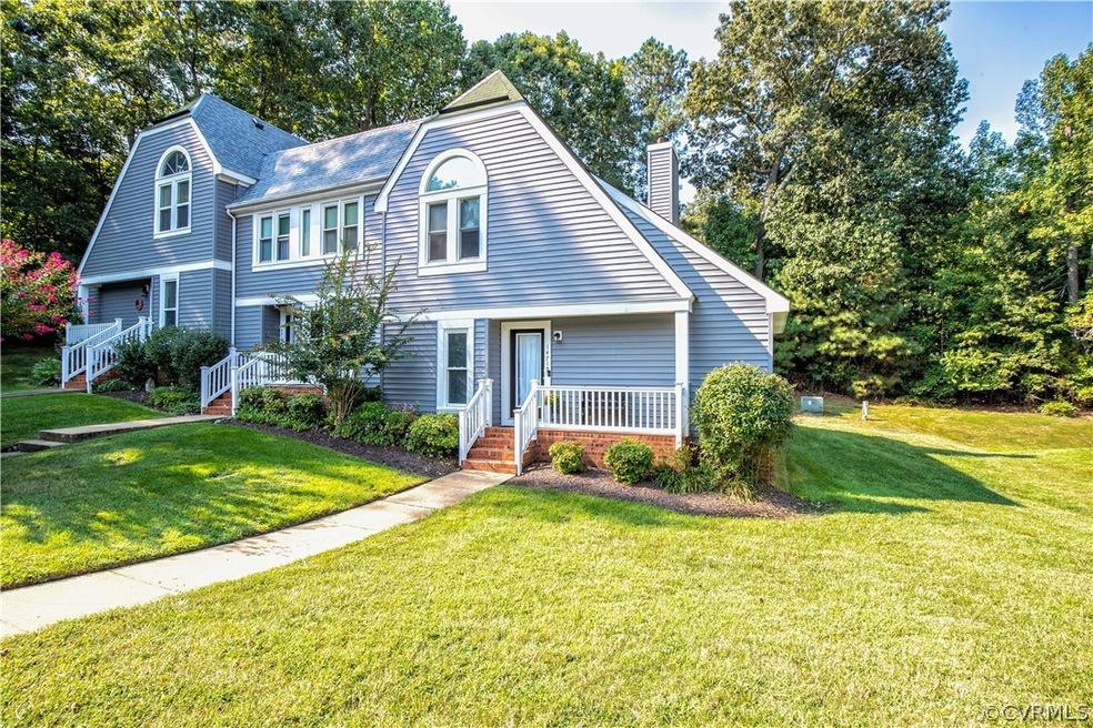 Lovely END UNIT townhome situated on a large lot w