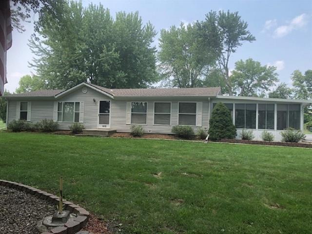 1412 Juniper St, Raymore, MO 64083 - photo 1