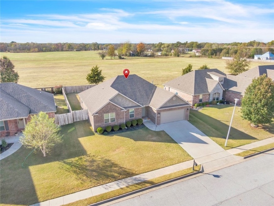 Property is located on a quiet street and backs up