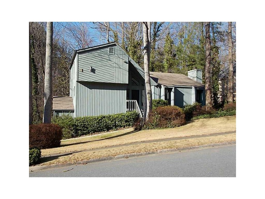 Exterior Front. Private Wooded Setting in East Cob