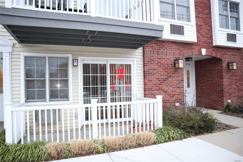 94-50 Magnolia Ct, Ozone Park, NY 11417 - photo 1