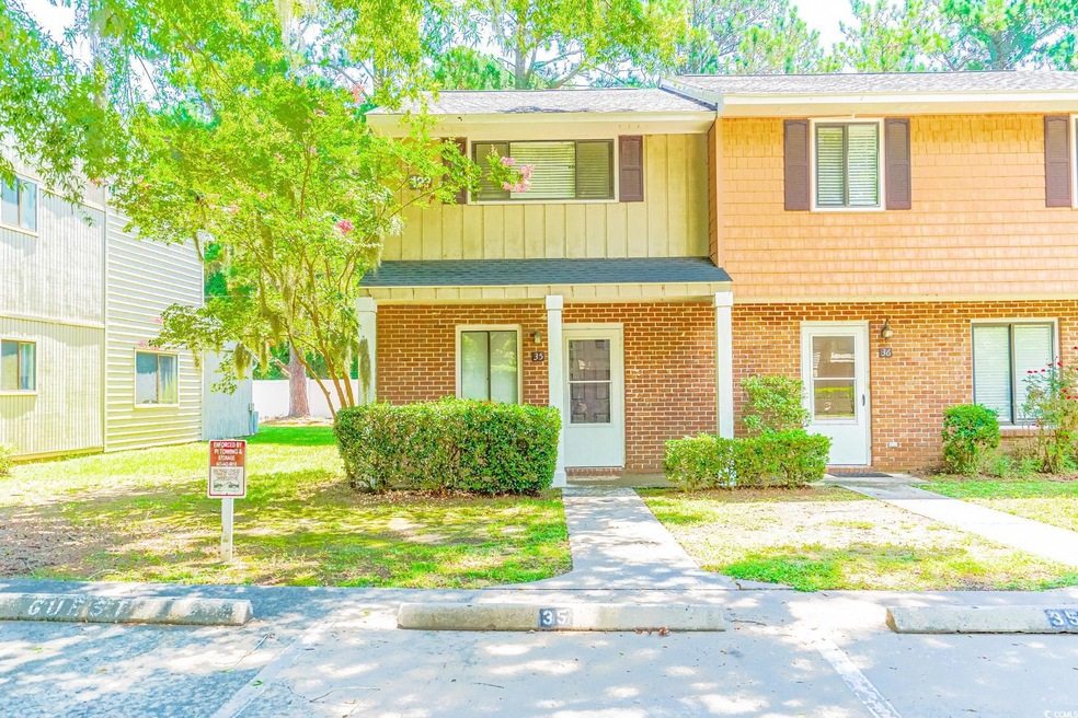 View of front of house with a front yard