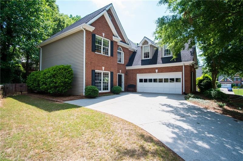 Beautiful brick front with young roof and side ent
