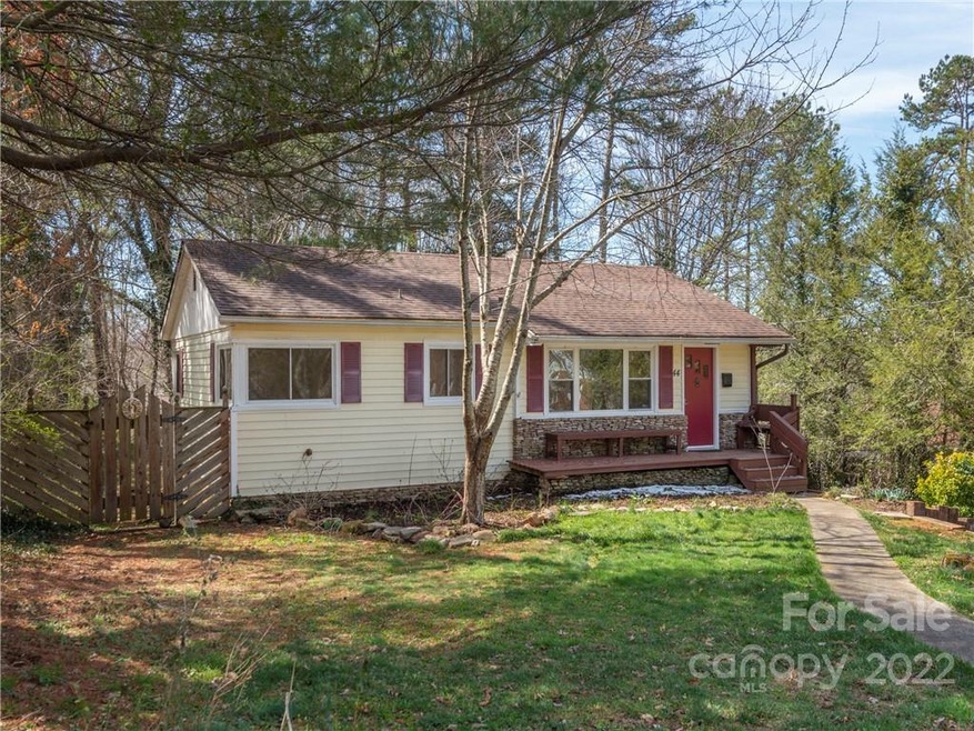 Beautiful mostly level yard with Weeping Cherry Tree