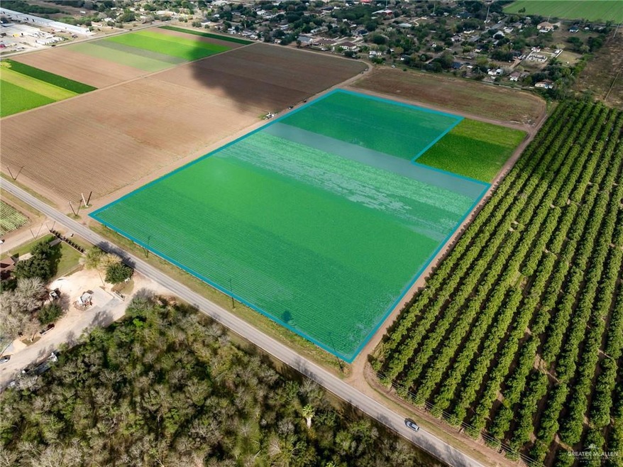 Birds eye view of property featuring a rural view