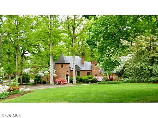 Exterior Front - 3/4 acre manicured lot.  Driveway