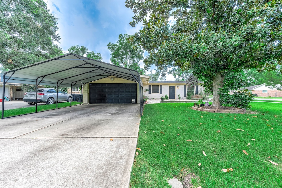 Charming single-story home with a large carport an