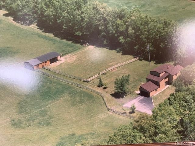 Overhead view of house when seller bought it, sinc