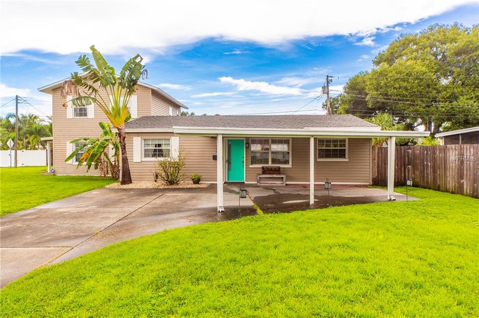 Front of home with carport