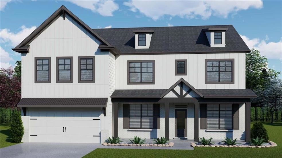 Modern farmhouse featuring a front yard and a gara