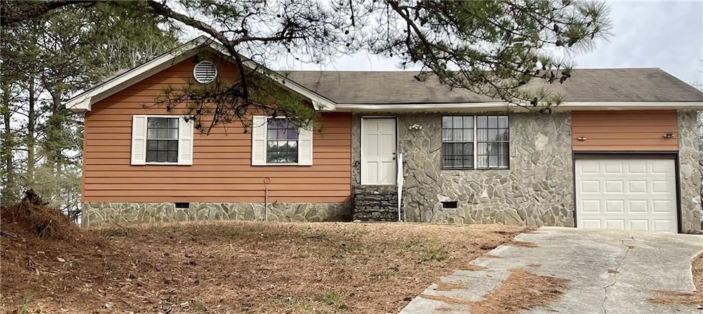 View of front of home with a garage