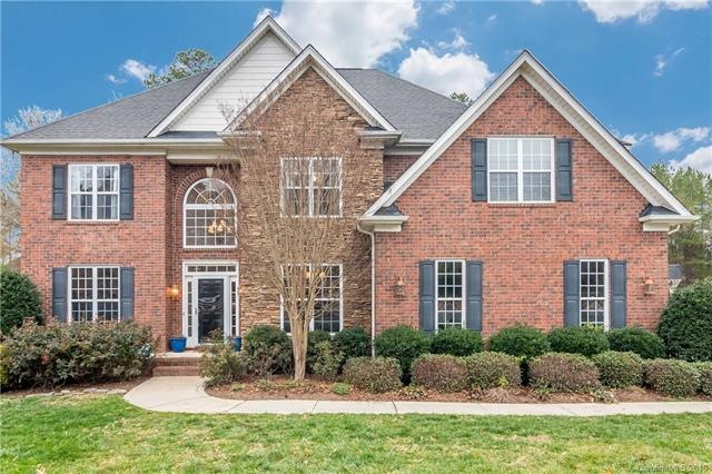 Nicely Landscaped, Brick Home with Stone Accent in