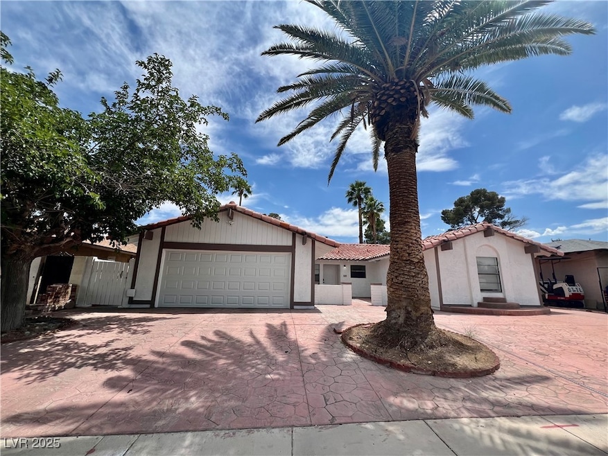 View of front of property with decorative driveway