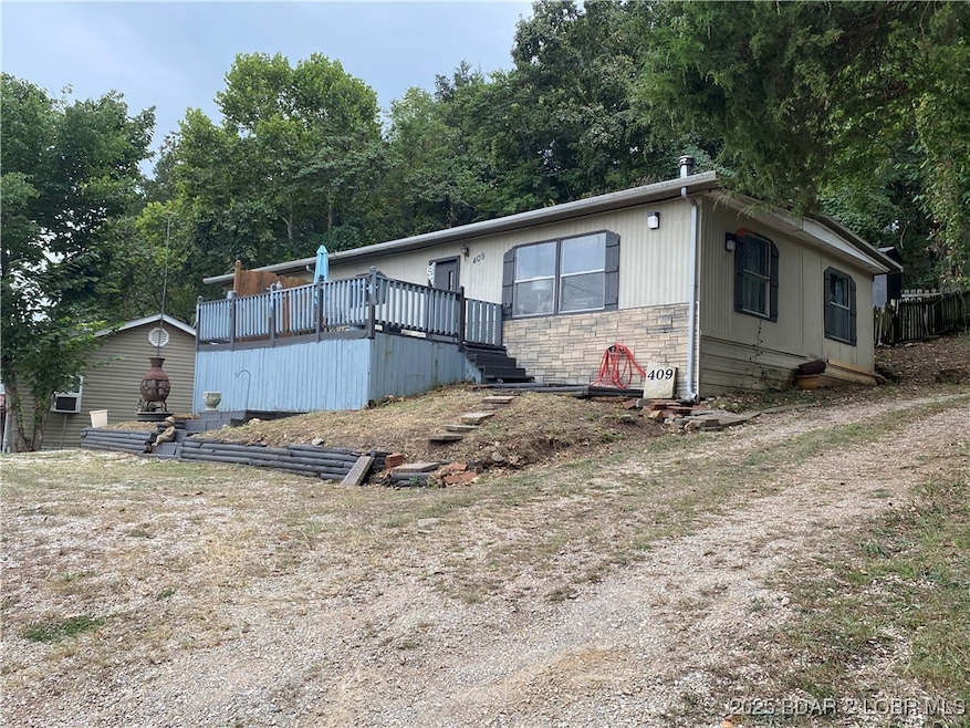 409 Gaynor Hollow Rd, Roach, MO 65787 - photo 1