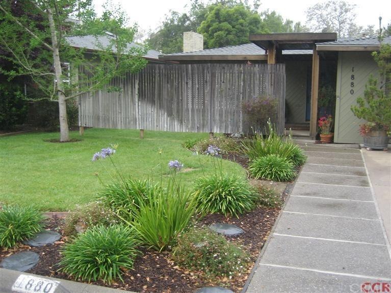 Rustic handsome entry and beautifully landscaped y