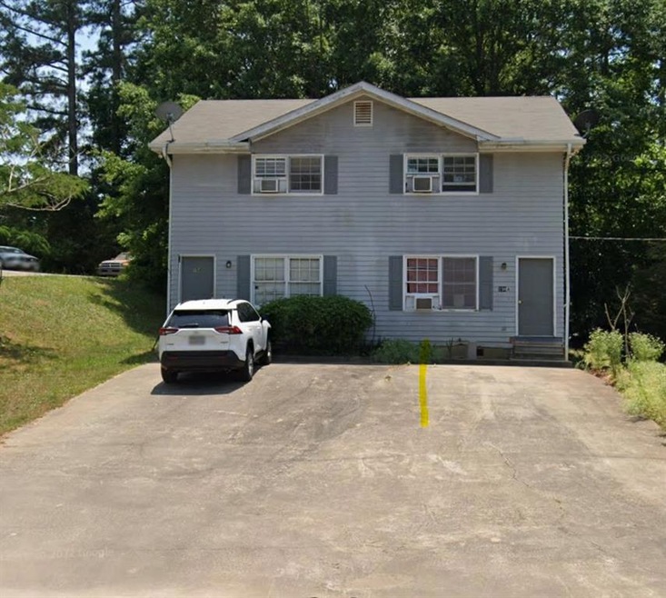 View of front of home with a front lawn