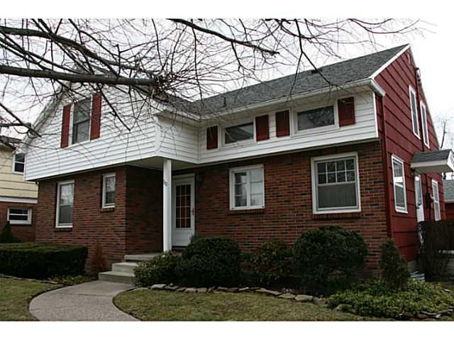 Exterior Front stately, attractive home on the cou