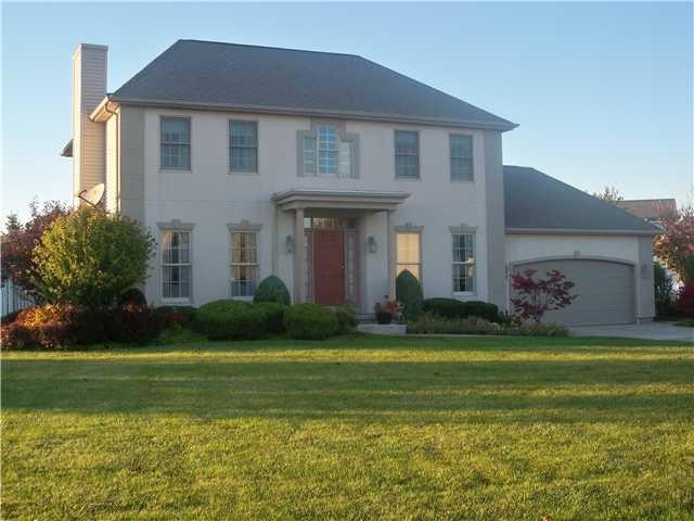 Exterior Front. Gracious home with stunning curb a