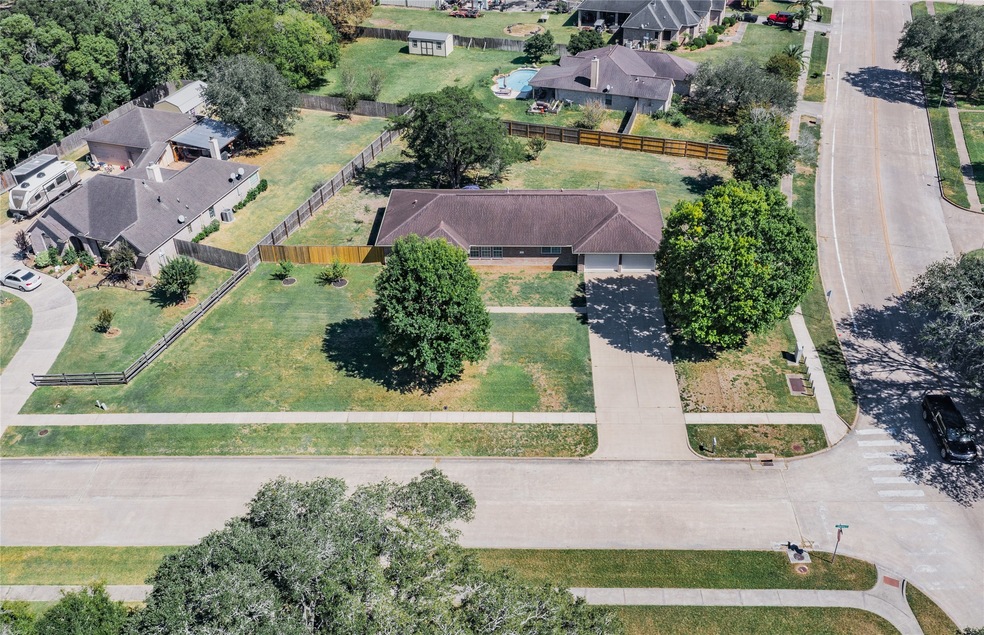 335 S Shirley St, Alvin, TX 77511 - photo 1