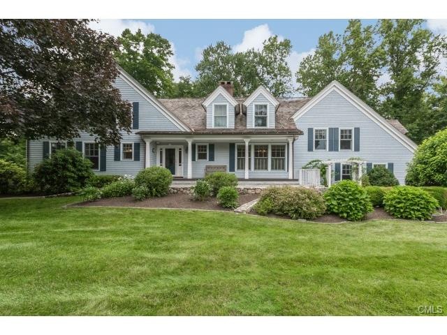 Lovely curb appeal featuring high-end cedar roof a