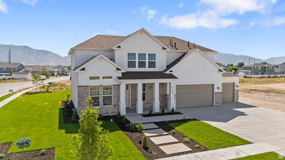 CRAFTSMAN ELEVATION! (PICTURE OF PREVIOUS BUILT HOME-COLORS AND MATERIALS MAY VARY)