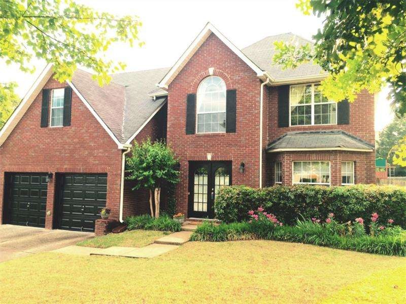 Traditional Brick front home w/ fenced level back 