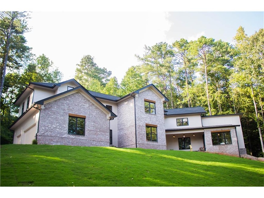 FRONT VIEW OF THE HOME SITTING HIGH