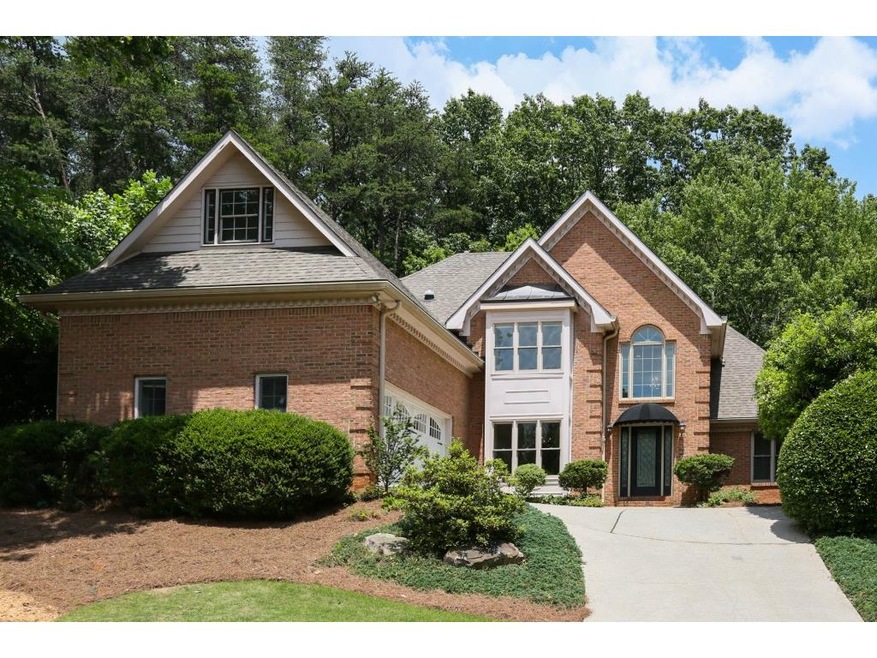 Stunning courtyard brick front home located in won