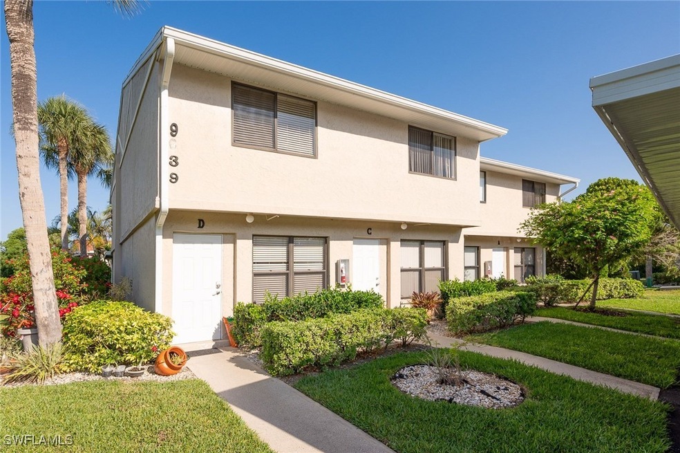 Multi unit property featuring stucco siding and a