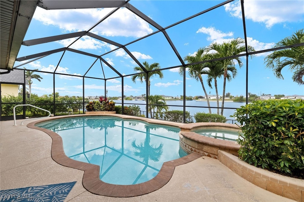 View of swimming pool featuring a water view, a po
