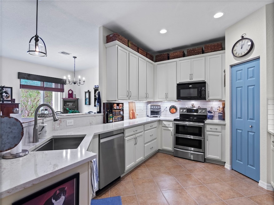 Impressive updated kitchen with pantry and under c