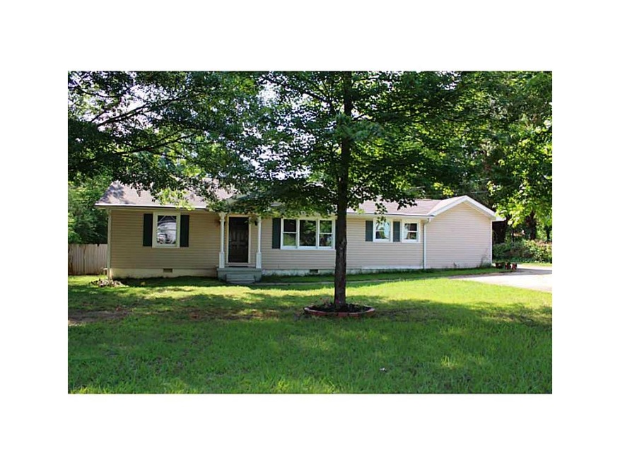 Exterior Front. Renovated 4 bedroom ranch on level