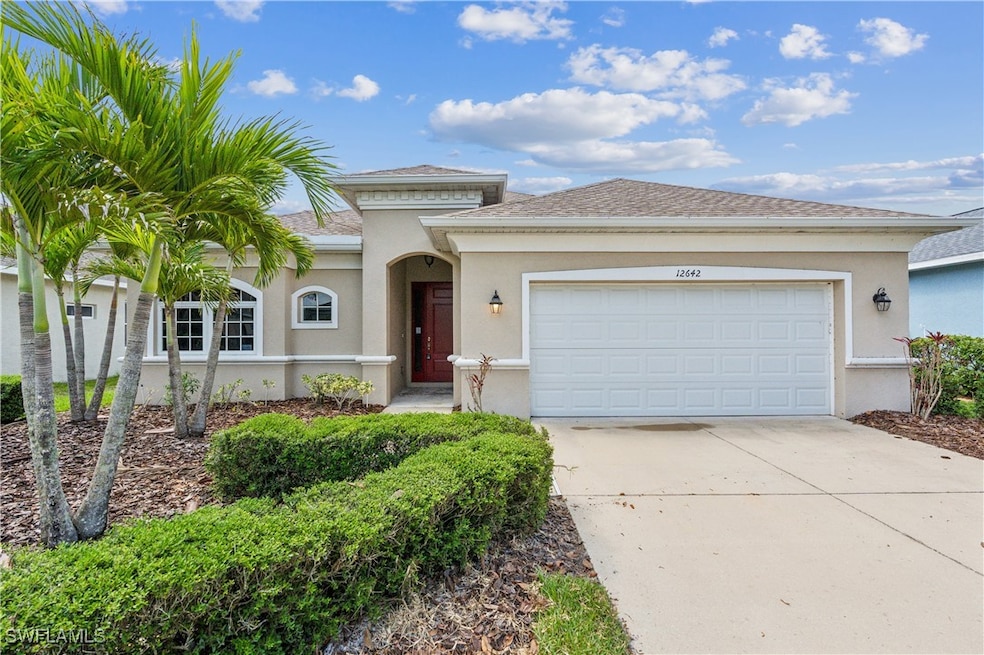 View of front of property featuring stucco siding,