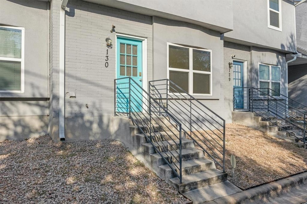 Entrance to property with brick siding