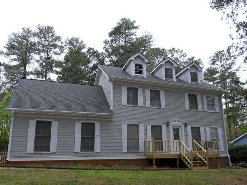 Exterior Front. New Roof and siding