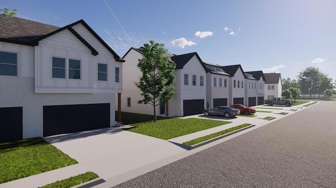 View of front of home featuring a garage and a fro