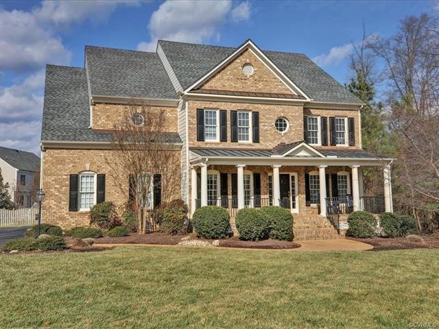 Welcome to 6000 Stonewick Ct, a stately 5 bedroom,