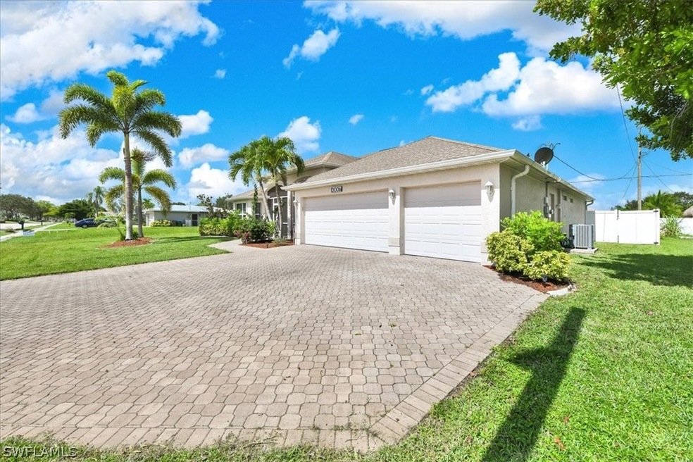 3-car Garage with wide pavered driveway
