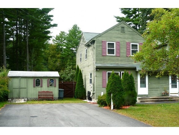 Front of house with shed