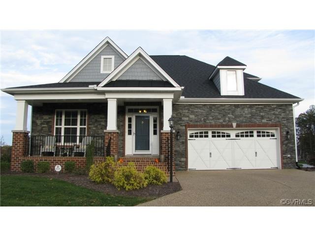Front of home. Gorgeous stacked stone & hardiplank