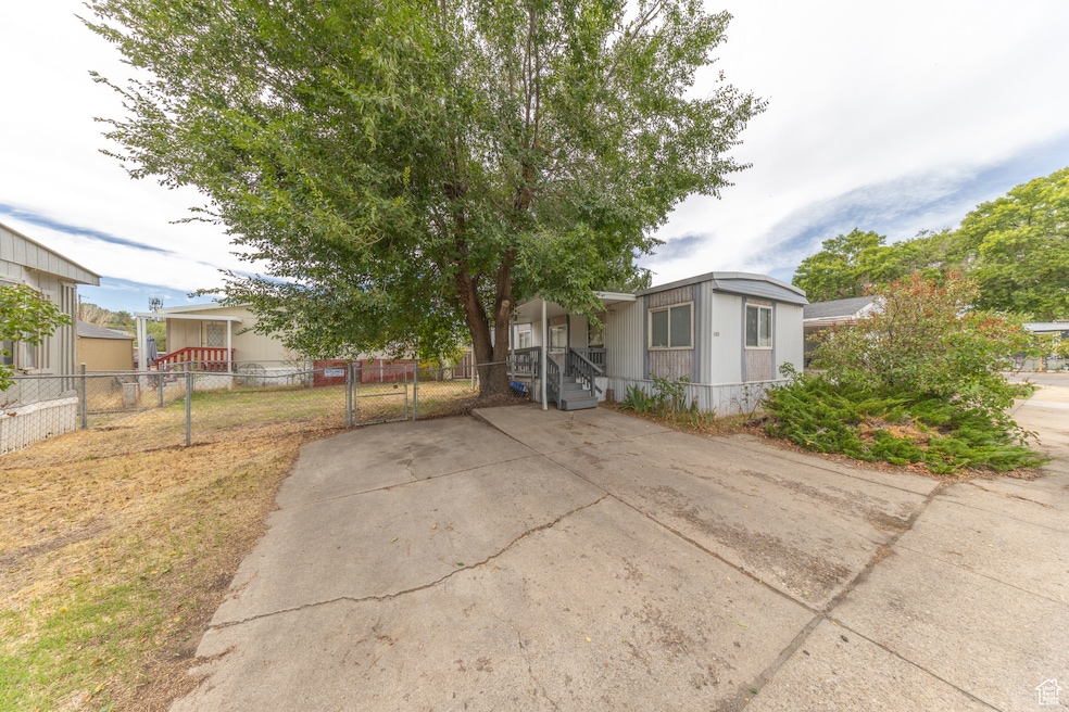 Manufactured / mobile home featuring a gate
