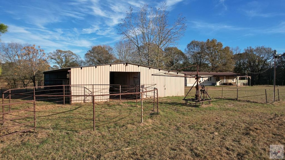 1009 County Road 4347, Bivins, TX 75555 - photo 1