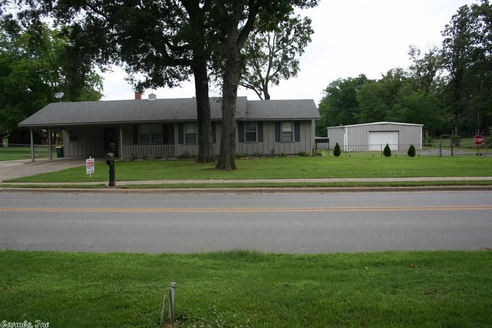 FRONT OF HOUSE WITH SHOP