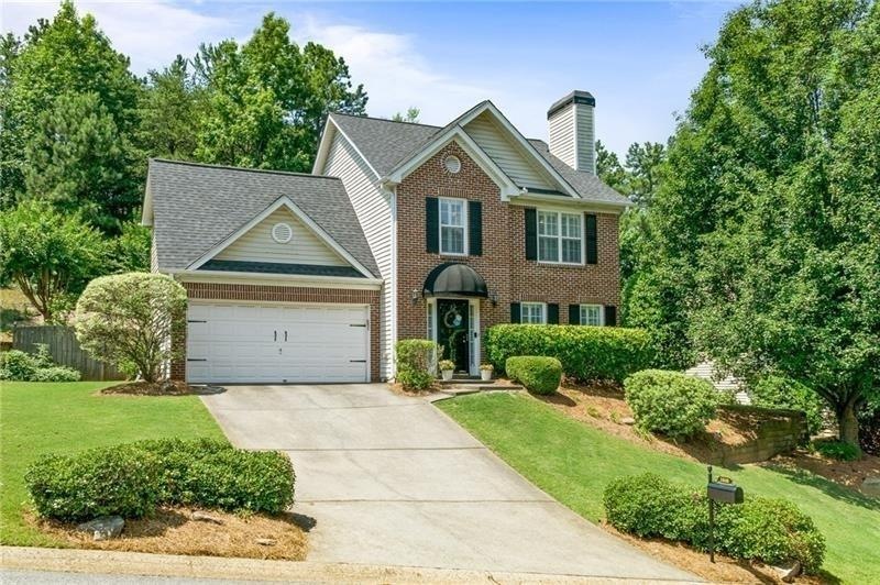 Traditional brick front home resplendent with char