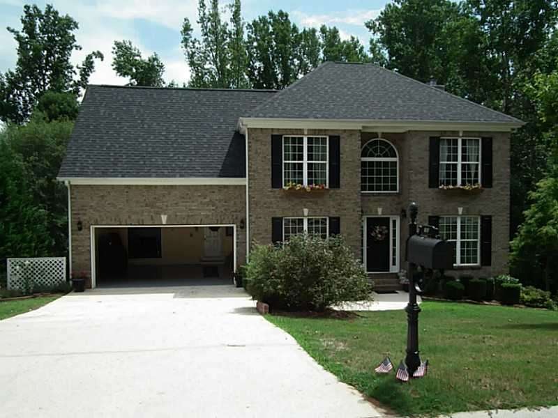 Exterior Front. 2 Car Garage for those precious ve