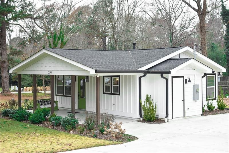 Picture perfect home on larger corner lot.