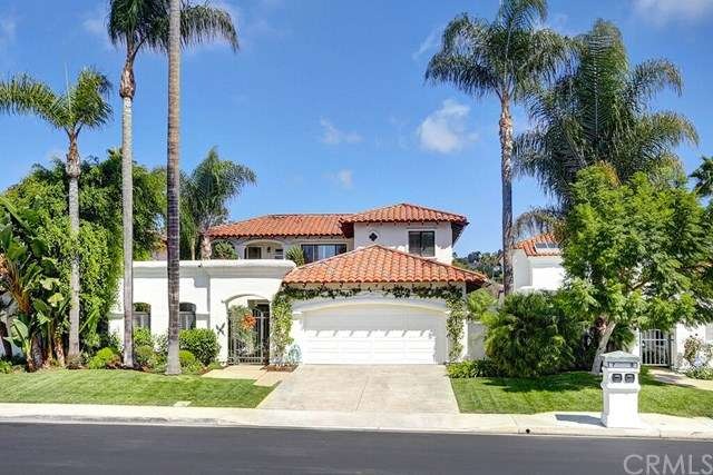 Spectacular curb appeal , lush landscaping, large 