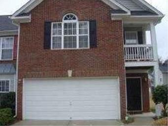 Exterior Front. BRICK FRONT EXTERIOR OF TOWNEHOME.